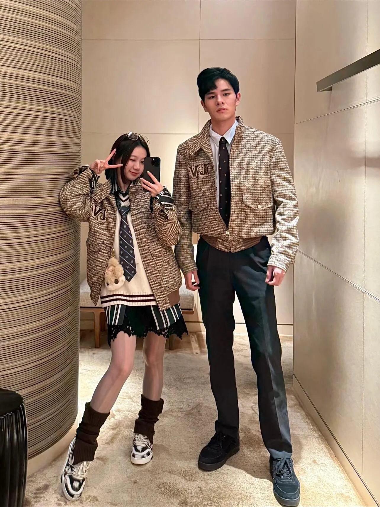 Louis Vuitton jacket with embroidered badges and all-over monogram print.